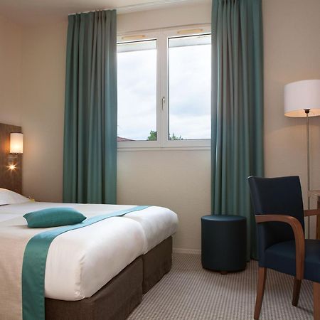 Logis Hotel Beausejour กอลมาร์ ภายนอก รูปภาพ